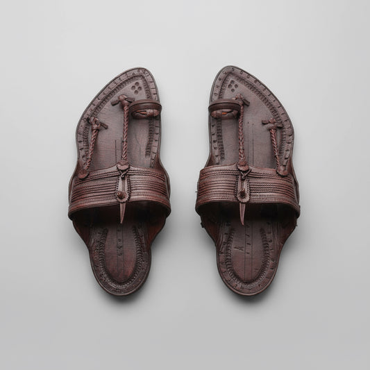 Pair of brown Just Kolhapuri’s by niira.