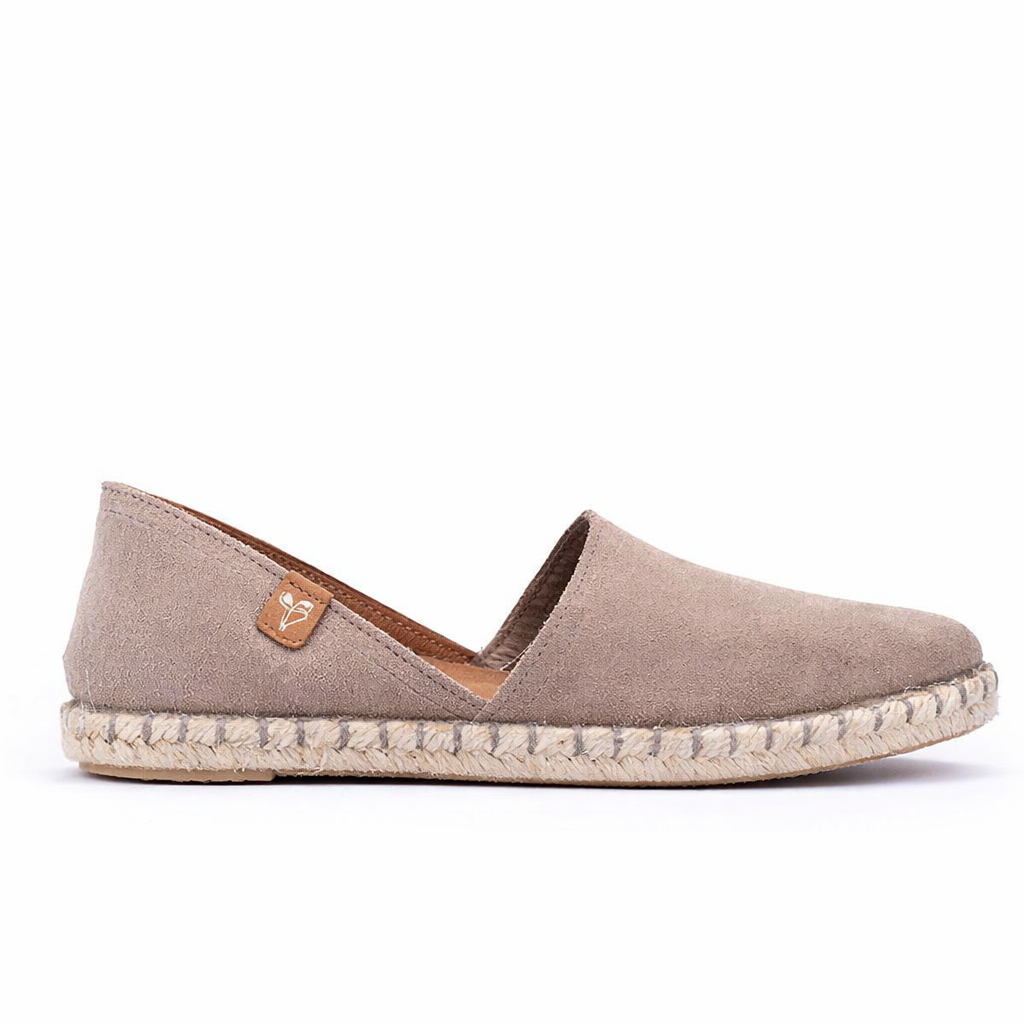 Beige espadrille shoe on a white background