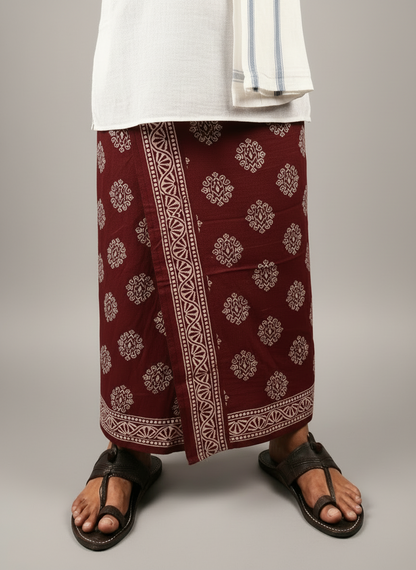 Person wearing a maroon patterned Wrap| Dhoti with a plain background