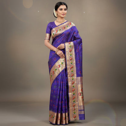 Colorful fabric with floral patterns and a purple fabric roll on a white background