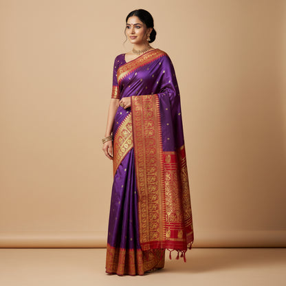 Purple and red saree with gold patterns on a white background