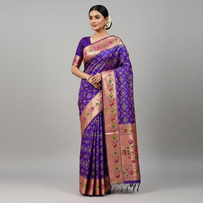 Purple and pink patterned fabric with a decorative roll on a white surface
