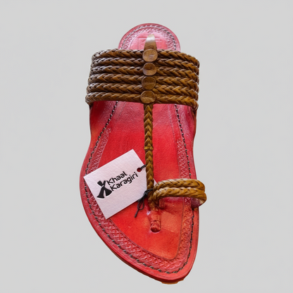 Red sandal with brown straps on a white background, featuring the Michael Kors logo.