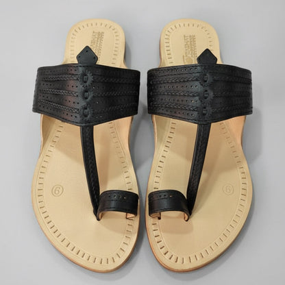Pair of black kolhapuris with beige soles