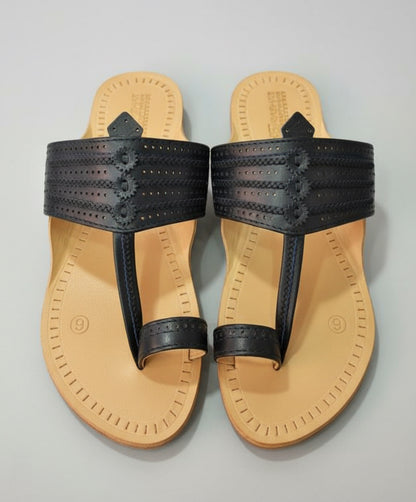 Pair of navy blue kolhapuri with tan soles