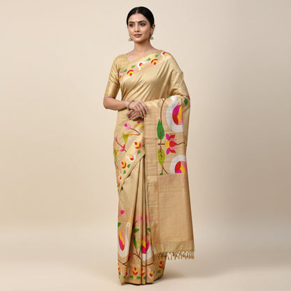 Beige fabric with colorful bird and leaf patterns on a light blue background