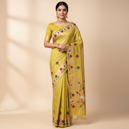Decorative yellow fabric with peacock and floral patterns on a white background