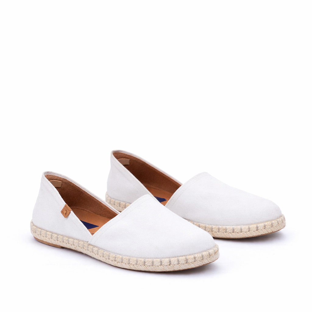 White espadrille shoes on a white background