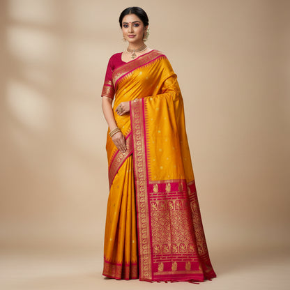 Yellow and red saree with intricate patterns on a white background